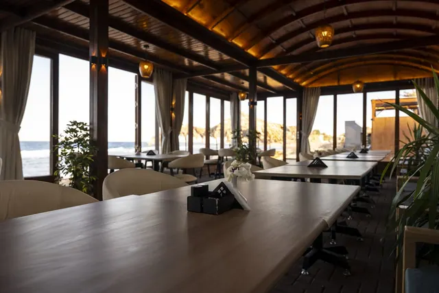 A long table beside the sea
